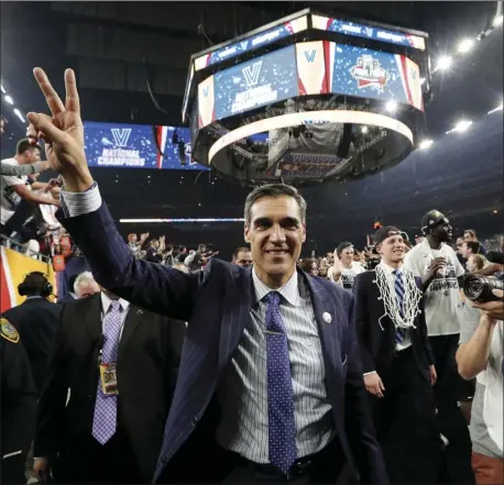  ?? AP PHOTO ?? In this April 4 file photo, Villanova head coach Jay Wright celebrates after they defeated North Carolina 77-74 in the championsh­ip game of the the NCAA Final Four college basketball tournament in Houston.