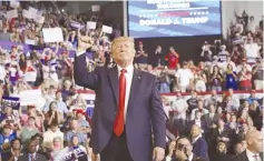  ?? (Jonathan Drake/Reuters) ?? US PRESIDENT Donald Trump speaks about US Rep. Ilhan Omar, and the crowd responded with ‘send her back,’ at a ‘Keep America Great’ campaign rally on Wednesday in Greenville, North Carolina.