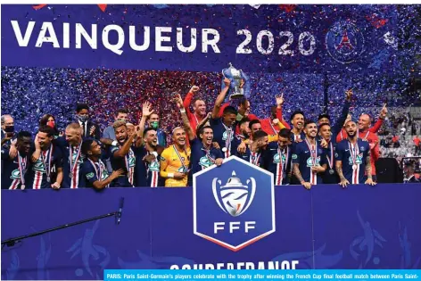  ?? — AFP ?? PARIS: Paris Saint-Germain’s players celebrate with the trophy after winning the French Cup final football match between Paris SaintGerma­in (PSG) and Saint-Etienne (ASSE) on July 24, 2020, at the Stade de France in Saint-Denis, outside Paris.