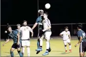  ?? YUMAS SUN FILE PHOTO ?? AWC’S ALEX AVILA (22) and Scottsdale’s Michael Driscoll go up for a header during a Sept. 12, 2017, game at AWC. Avila is one of the Matadors’ top returning players this year.