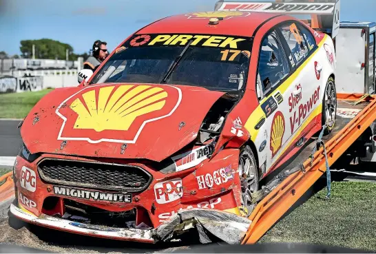  ?? PHOTOSPORT ?? The front of Scott Mclaughlin’s Ford Falcon FGX is badly mangled after the New Zealand Supercars driver crashed into a wall at about 120kmh during a practice session at Pukekohe yesterday.