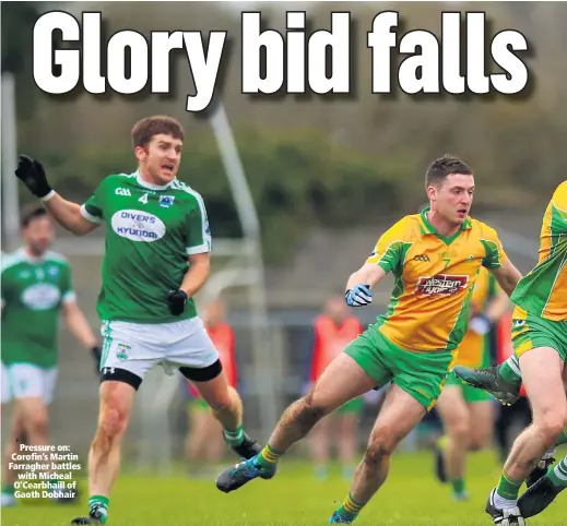  ??  ?? Pressure on: Corofin’s Martin Farragher battles with Micheal O’Cearbhaill of Gaoth Dobhair
