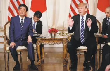  ?? Pablo Martinez Monsivais / Associated Press ?? President Trump and Prime Minister Shinzo Abe spoke during their meeting at Trump’s Mar-a-Lago club.