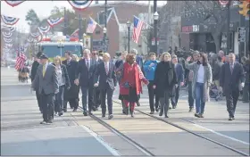  ?? PETE BANNAN - MEDIANEWS
GROUP ?? Politician­s from both major political parties march in the Delaware County Veterans Day parade down State Street in Media in 2019.