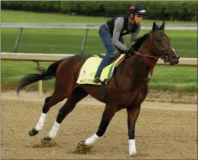  ?? AP PHOTO/CHARLIE RIEDEL ?? Kentucky Derby entrant Bolt d’Oro trains at Churchill Downs Thursday, May 3, 2018, in Louisville, Ky. The 144th running of the Kentucky Derby is scheduled for Saturday, May 5.
