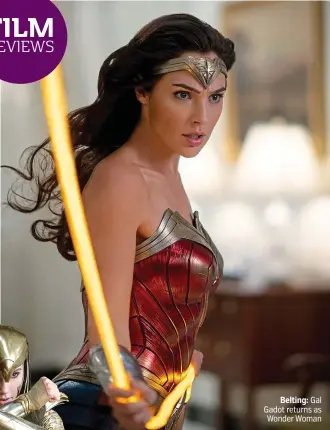  ??  ?? Belting: Gal Gadot returns as Wonder Woman