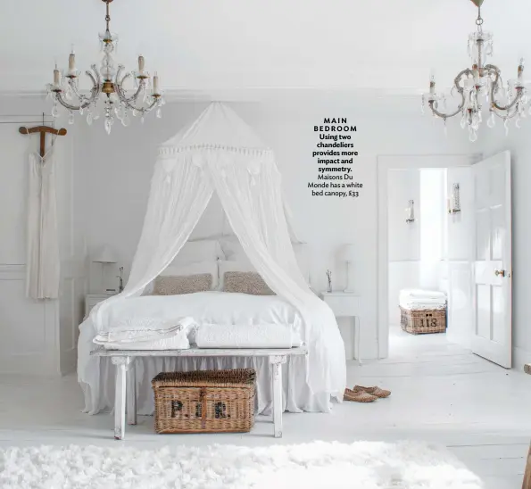  ??  ?? MAIN BEDROOM Using two chandelier­s provides more impact and symmetry. Maisons Du Monde has a white bed canopy, £33
