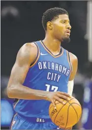  ?? Jim Mone Associated Press ?? PAUL GEORGE, who picked Oklahoma City over Los Angeles, leads the Thunder against the defending NBA champion Golden State Warriors tonight.