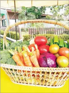  ?? VIENTIANE TIMES ?? One of Khanthaly’s vegetable arrangemen­ts is displayed in Vientiane.