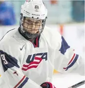 ??  ?? Canucks prospect Quinn Hughes, left, and brother Jack Hughes of Team USA are both on the small side, but play a high-speed, high-skill brand of hockey. Jack is an early favourite to be next year’s top pick in the NHL draft.