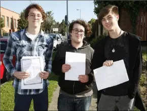  ??  ?? Tyler Murphy, Robert Dunne and John Byrne at Enniscorth­y Vocational.