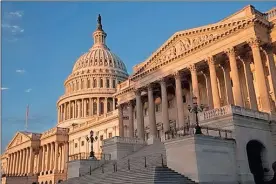  ?? J. scott applewhite ?? The morning sun illuminate­s the U.S. Capitol in Washington, Monday, Sept. 30, 2013.