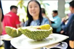  ??  ?? China decided to allow imports of Malaysian whole durians in May. Ever since, fruit traders in China and Malaysia have been blazing a trail in the multibilli­on yuan durian market.