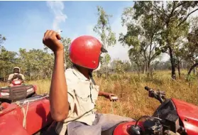  ??  ?? Former pastoral property, Fish River, is the site of Australia’s first savannah burning project under the Carbon Farming Initiative. Shaun Ansell (below) surveys the outcome of an early dry season, low-intensity fire that was lit to prevent highly...