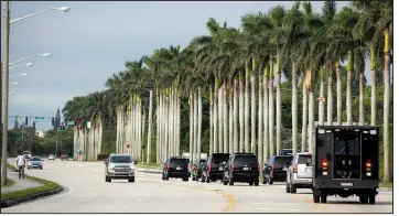  ?? The New York Times/AL DRAGO ?? President Donald Trump’s motorcade arrives at Trump Internatio­nal Golf Club on Nov. 25, 2017.