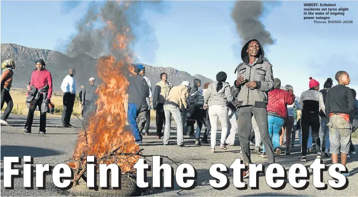  ?? Pictures: BHONGO JACOB ?? UNREST: Ezibeleni residents set tyres alight in the wake of ongoing power outages