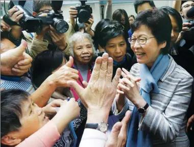  ?? ROY LIU / CHINA DAILY ?? Supporters greet