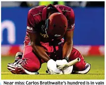  ?? GETTY IMAGES ?? Near miss: Carlos Brathwaite’s hundred is in vain as West Indies lose to New Zealand