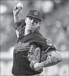  ?? [ERIC CHRISTIAN SMITH/THE ASSOCIATED PRESS] ?? Indians starter Mike Clevinger mixed speeds effectivel­y and took a no-hitter into the seventh inning before Jose Altuve singled for the Astros.