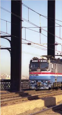  ??  ?? In another photo from August 24, 1983, AEM7 913 skims across the main span with a train for Boston. Today, Amtrak ACS64 locomotive­s and Acela trains are the rule here, plus infrequent CSX and Providence & Worcester freights.