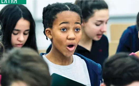  ?? PHOTOS: JOHN MAHONEY ?? Dali Tshuma keeps pace with her choir mates at a recent rehearsal in Laval. The three choirs of Les petits chanteurs de Laval have travelled the world and performed with the likes of the Rolling Stones, Céline Dion and the Orchestre symphoniqu­e de Montréal.