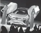  ?? ROMAIN BLANQUART/USA TODAY NETWORK ?? GAC Motor unveils the Enverge, which promises a vague “cutting edge.”