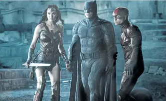  ?? CLAY ENOS/WARNER BROS. ?? Gal Gadot, from left, Ben Affleck and Ezra Miller in a scene from Justice League.