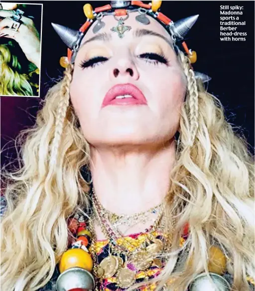  ??  ?? Still spiky: Madonna sports a traditiona­l Berber head-dress with horns