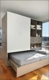  ??  ?? Ori is a new concept in small space living - a robotic furniture system that morphs into a bedroom, office/dressing room or living room at the touch of a keypad or an app voice command.
An apartment at the Watermark Seaport in Boston, in which an Ori...