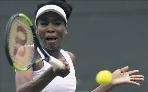  ?? Tim Ireland/Associated Press ?? Williams struggled but ultimately beat Elise Mertens, 7-6 (7), 6-4, Monday in her first match since a June 9 car crash in Florida.