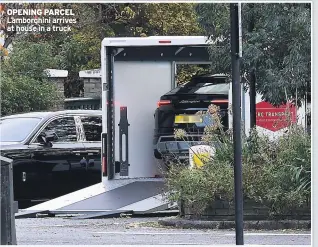  ??  ?? OPENING PARCEL Lamborghin­i arrives at house in a truck