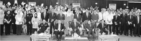  ??  ?? Pairin (seated middle) flanked by Hasbilah (seated left), Ghulam (seated, second from left), Bobbey (seated second from right) and Michael (seated right) at the ceremony yesterday.