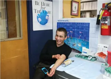  ?? GABRIELLE LURIE PHOTOS/SAN FRANCISCO CHRONICLE ?? Lucky Choi, 59, smiles after getting his blood drawn in Dr. Jay Levy’s office at UCSF, in San Francisco.