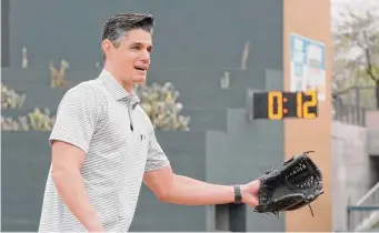  ?? Photos by Morry Gash/Associated Press ?? MLB’s vice president of on-field strategy Joe Martinez talked about some of the logistics of how the new pitch clock will work. All rule changes will be “full go” from the start of spring training.