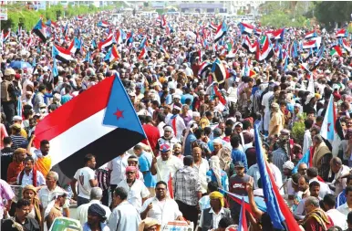  ?? (Fawaz Salman/Reuters) ?? SUPPORTERS OF Yemen’s UAE-backed southern separatist­s march during a rally in Aden yesterday.