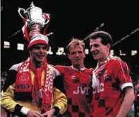  ??  ?? Cup kings: 1990 and Dons trio, from left, Theo Snelders, Alex McLeish and Brian Irvine celebrate