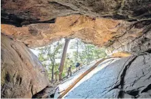  ?? OKLAHOMA TOURISM] ?? Robbers Cave State Park's trail systems is made up of about 22 miles total of hiking trails, including multi-use ones. [LORI DUCKWORTH/