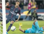  ?? AP ?? Paris Saint-Germain’s (PSG) Neymar scores against Toulouse during the French Ligue 1 football match between PSG and Toulouse at the Parc des Princes stadium in Paris, France, yesterday.