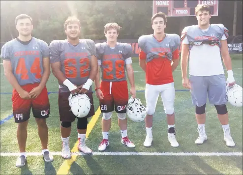  ?? David Fierro / Hearst Connecticu­t Media ?? From left to right, Jack Warren, Eddy Iuteri, Spencer Hartley, Evan Weigold and Callum Abernethy are senior captains of the Greenwich High football team.