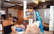  ?? JUSTICE DEPARTMENT VIA AP ?? This image, contained in the report from special counsel Robert Hur, shows the cluttered garage of President Joe Biden in Wilmington, Del., during a search by the FBI on Dec. 21, 2022.