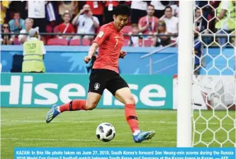  ?? — AFP ?? KAZAN: In this file photo taken on June 27, 2018, South Korea’s forward Son Heung-min scores during the Russia 2018 World Cup Group F football match between South Korea and Germany at the Kazan Arena in Kazan.