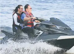  ??  ?? Soon Koh rides a jetski to symbolical­ly start the Unity Sportsmans­hip Challenge race.