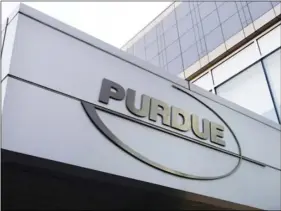  ??  ?? This May 8, 2007, file photo shows the Purdue Pharma logo its o ces in Stamford, Conn. AP PHOTO/DOUGLAS HEALEY