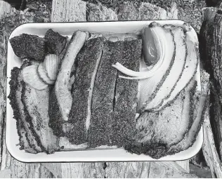  ?? Mike Sutter / Staff file photo ?? Meats at Burnt Bean Co. barbecue restaurant in Seguin include, from left, lean brisket, pork ribs, turkey and moist brisket.