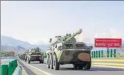  ?? HT FILE ?? Chinese armoured vehicles in a military drill in Tibet. Experts said the 25metre wide highway can be used by armoured vehicles and serve as a runway for military aircraft.