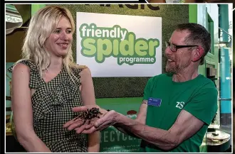  ?? ?? TOUCHING MOMENT Lydia looks uncomforta­ble as Dave Clark holds out the furry spider