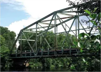  ??  ?? ABOVE: The Brownville Road Bridge outside Millinocke­t, Maine, is said to be haunted by “the Lady of Millinocke­t”, a typical White Lady ghost.