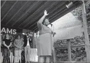  ?? File ?? This October 2018 file photo shows Stacey Abrams as she greets supporters in the Schroeder’s New Deli courtyard .