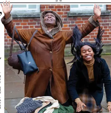  ??  ?? Brazen: Henrietta Mitaiare, right, celebrates with her mother yesterday