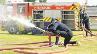  ?? PHOTO: LINDA ROBERTSON ?? Well aimed . . . Oamaru firefighte­r Darryl Hansen shoots for the target in the monitor run at the Otago and Southland Waterway firefighti­ng competitio­n, in Mosgiel on Saturday.